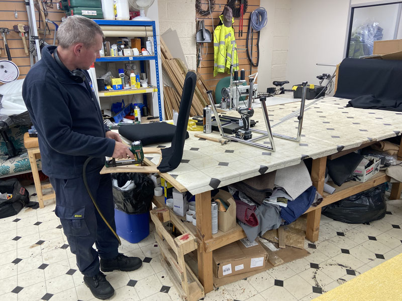 An experience staff member hard at work on another unusual bespoke order