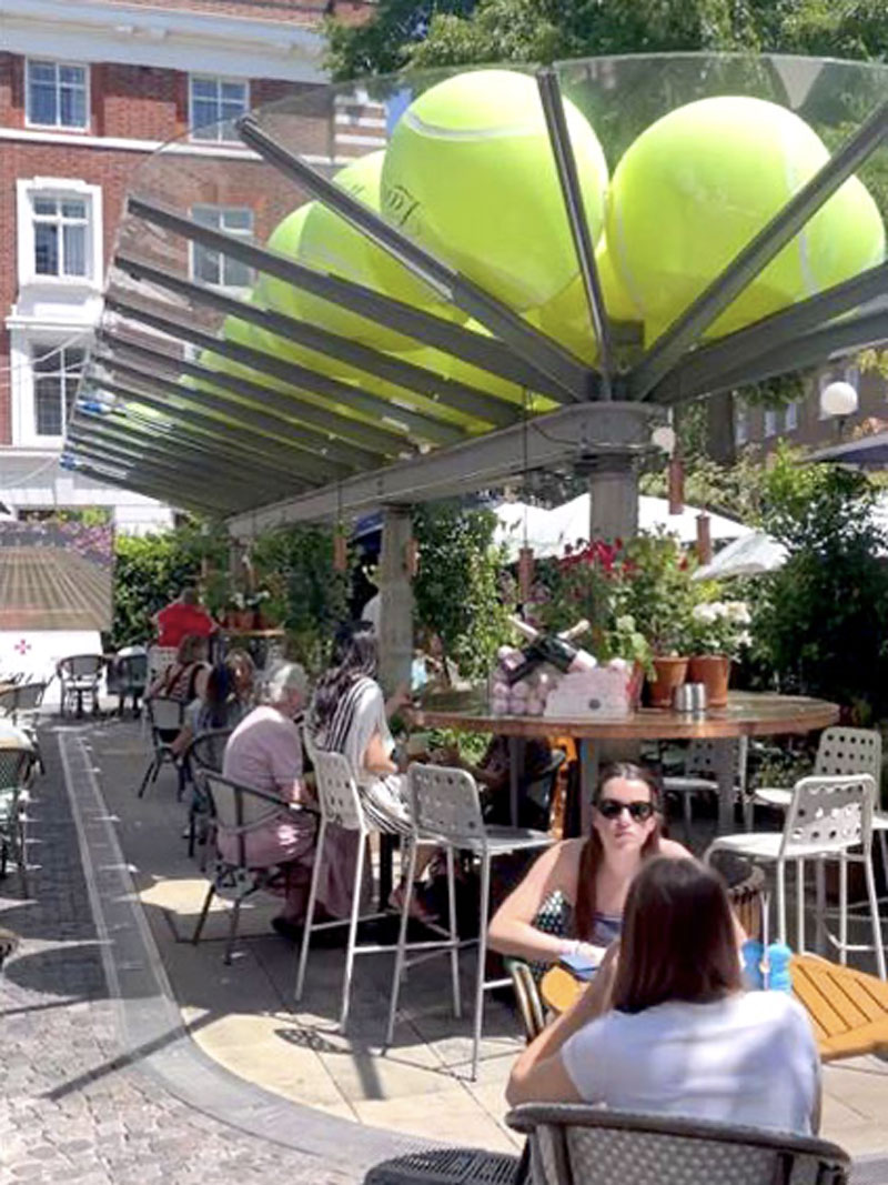 Giant golf balls for a Wimbledon cafe